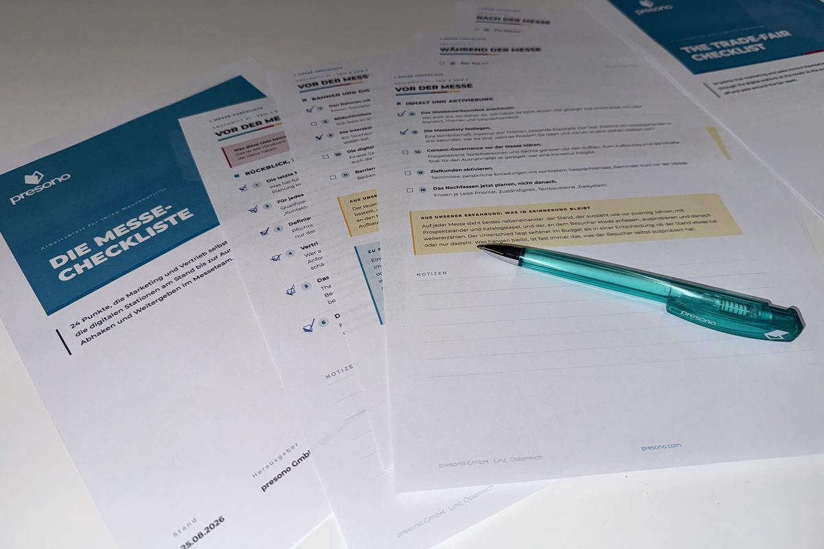 The printed trade-fair checklist on a table, with a pen beside it.
